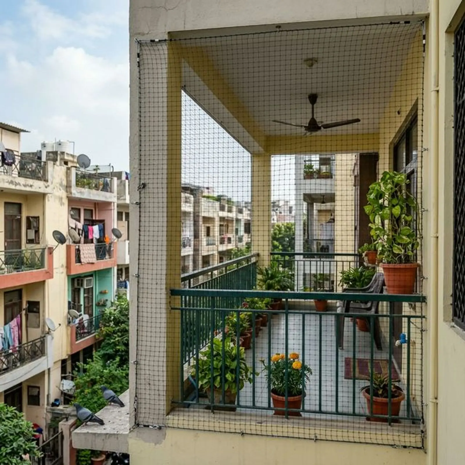 Residential balcony protected with safety net